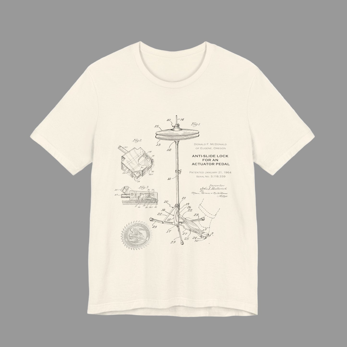 Beige t-shirt with technical diagram design on a white background