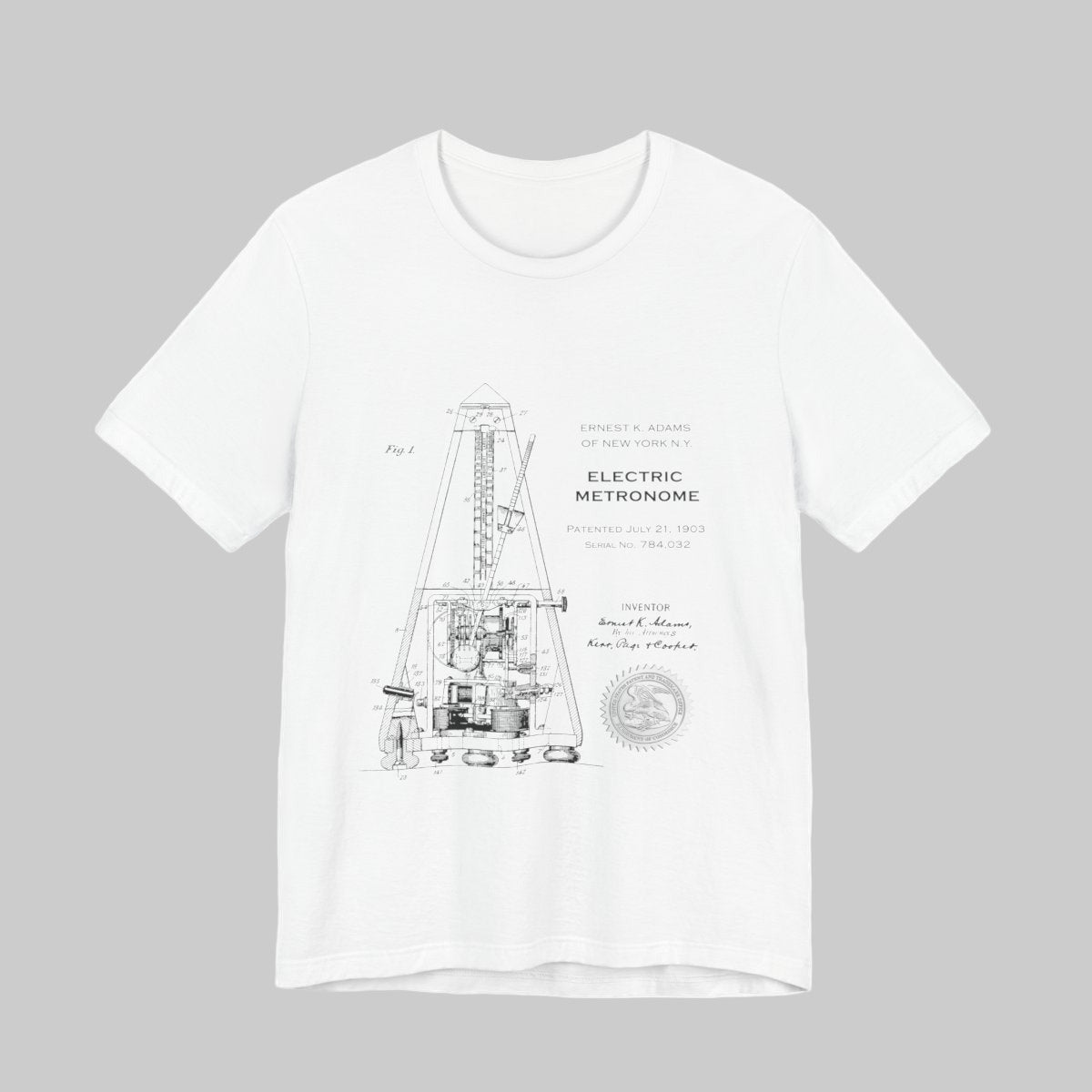White t-shirt with black technical drawing and text on a white background