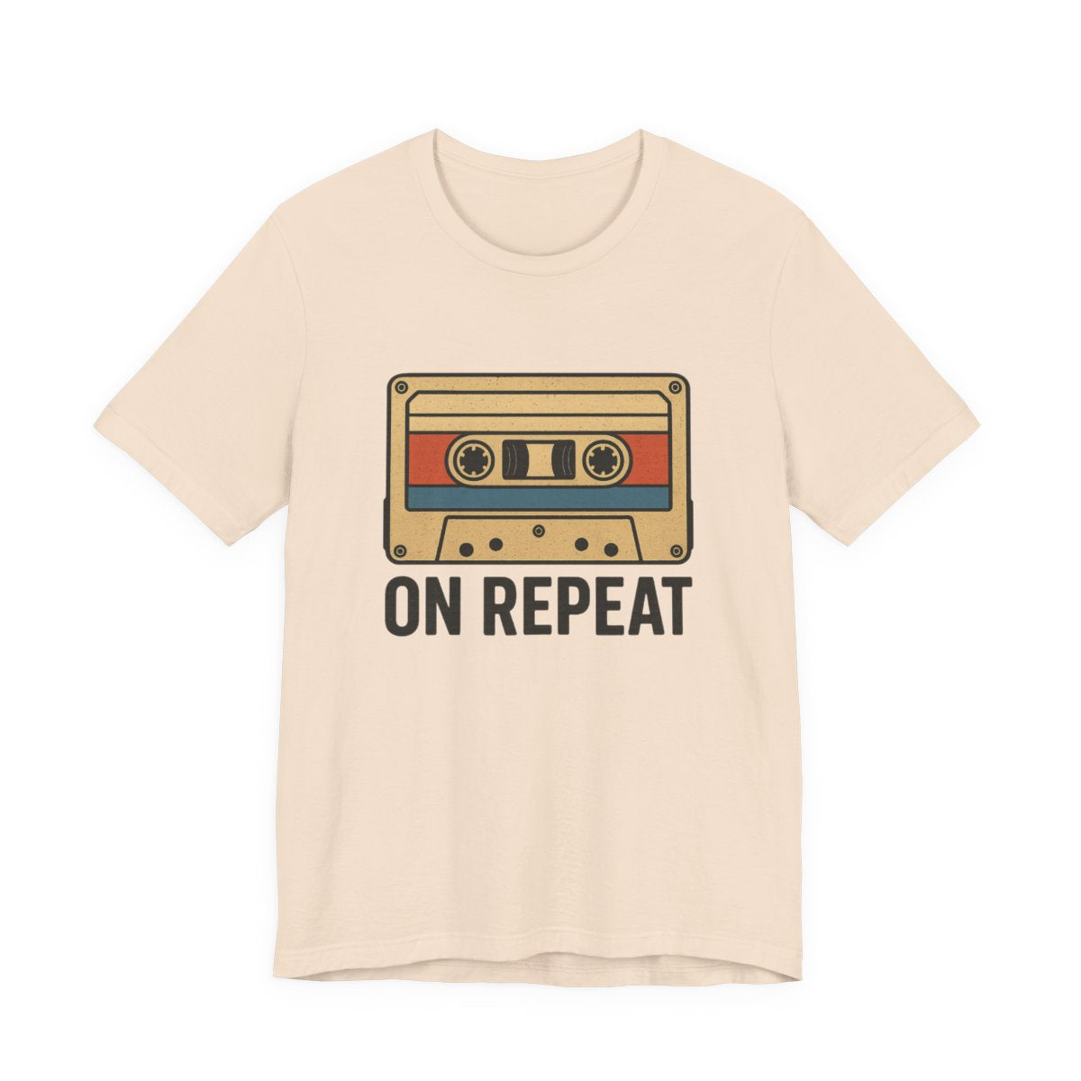 Natural white t-shirt with a cassette tape graphic and 'On Repeat' text on a white background