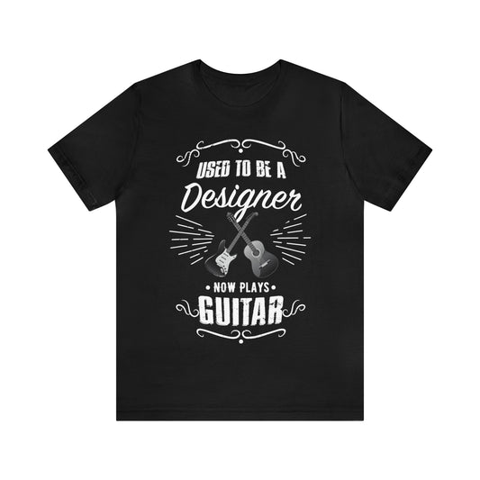 Used to be a DESIGNER; Now Plays GUITAR - Funny Retirement Gift, Unisex T-shirt Bella+Canvas 3001, dark shirt colors for amateur musician/guitar player