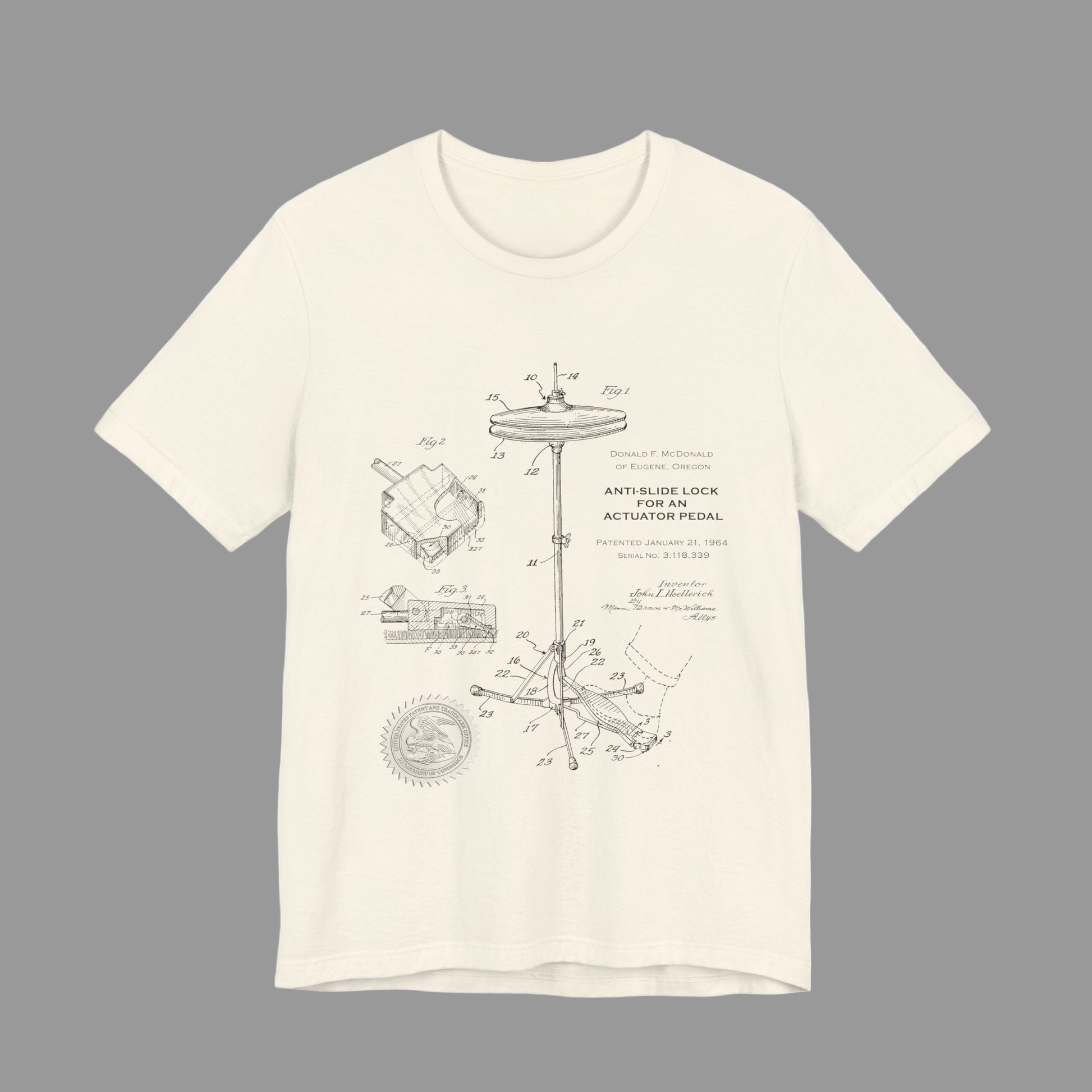 Beige t-shirt with technical diagram design on a white background