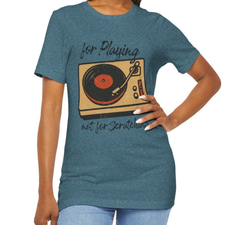 Woman wearing a blue t-shirt with a graphic design on a white background