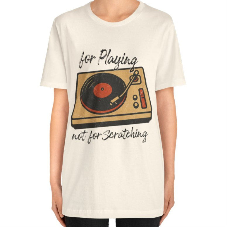 Person wearing a white t-shirt with a graphic design and text on a white background