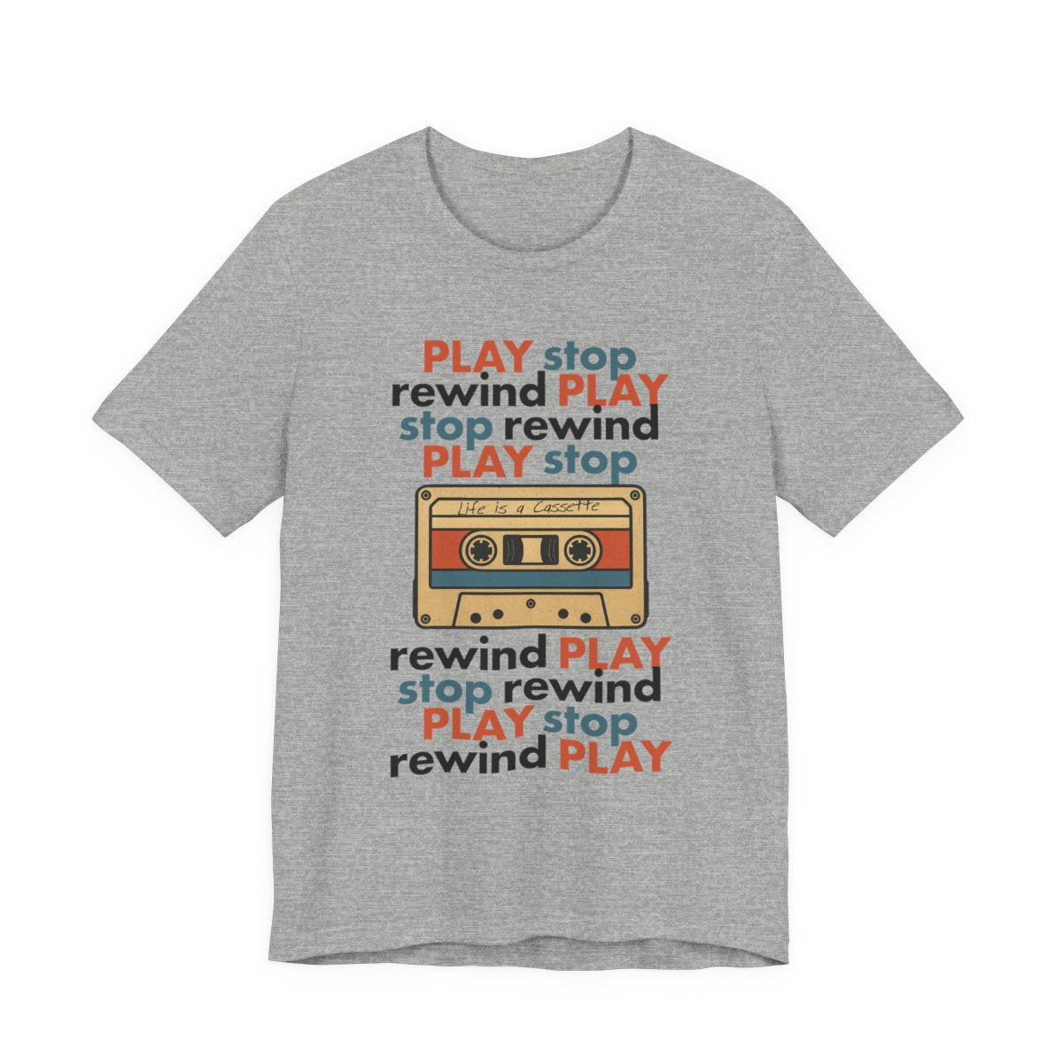 Gray t-shirt with a colorful cassette tape graphic and 'Play stop rewind' text on a white background
